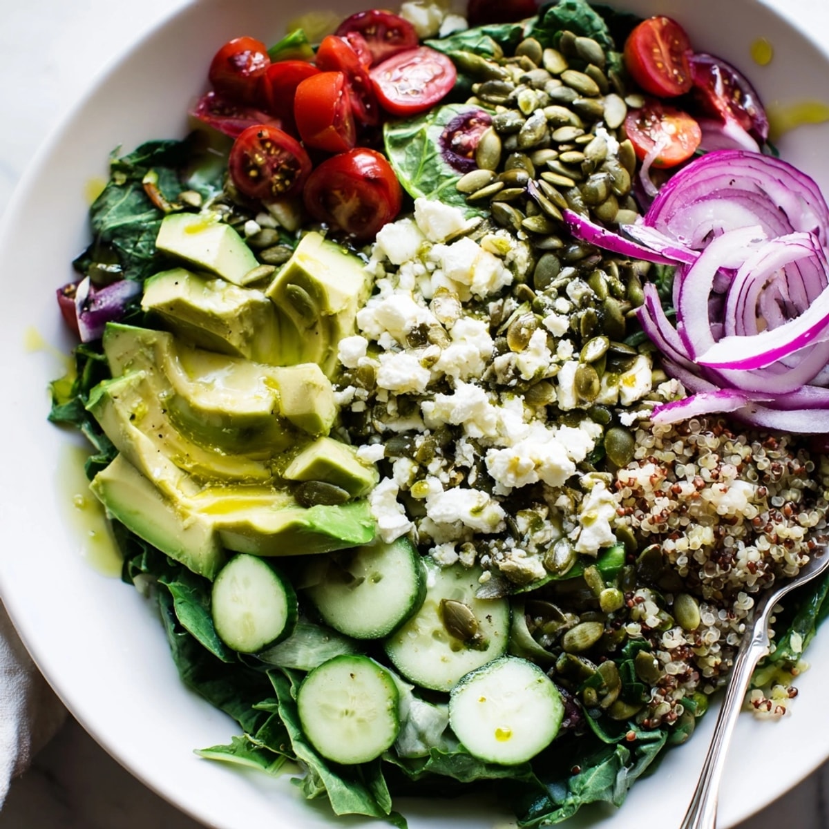 Wholesome Avocado Greens Power Salad, showing the creamy avocado and crunchy pumpkin seeds.