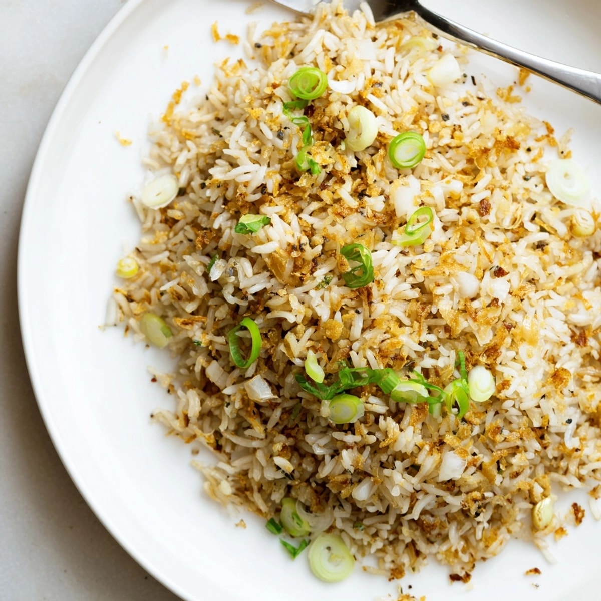 Savory Garlic Fried Rice: Close-up shot capturing the glistening texture in easy stir-fry.