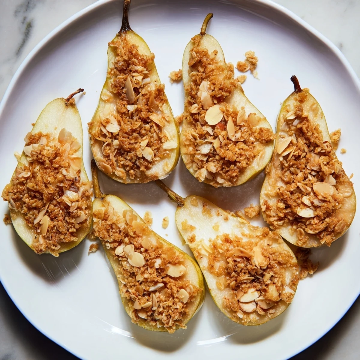 Serving plate with Toasty Ginger Pears, drizzled with yogurt for added sweetness and flavor.