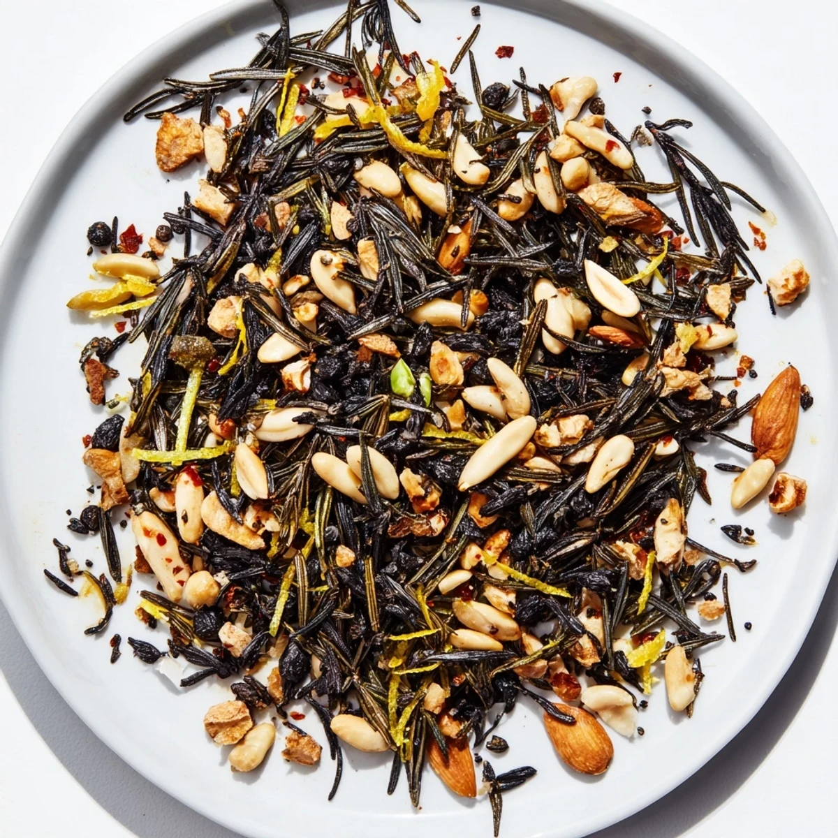Smoky Charred Evergreen Mix with toasted nuts and citrus zest, ready to enjoy as a snack.