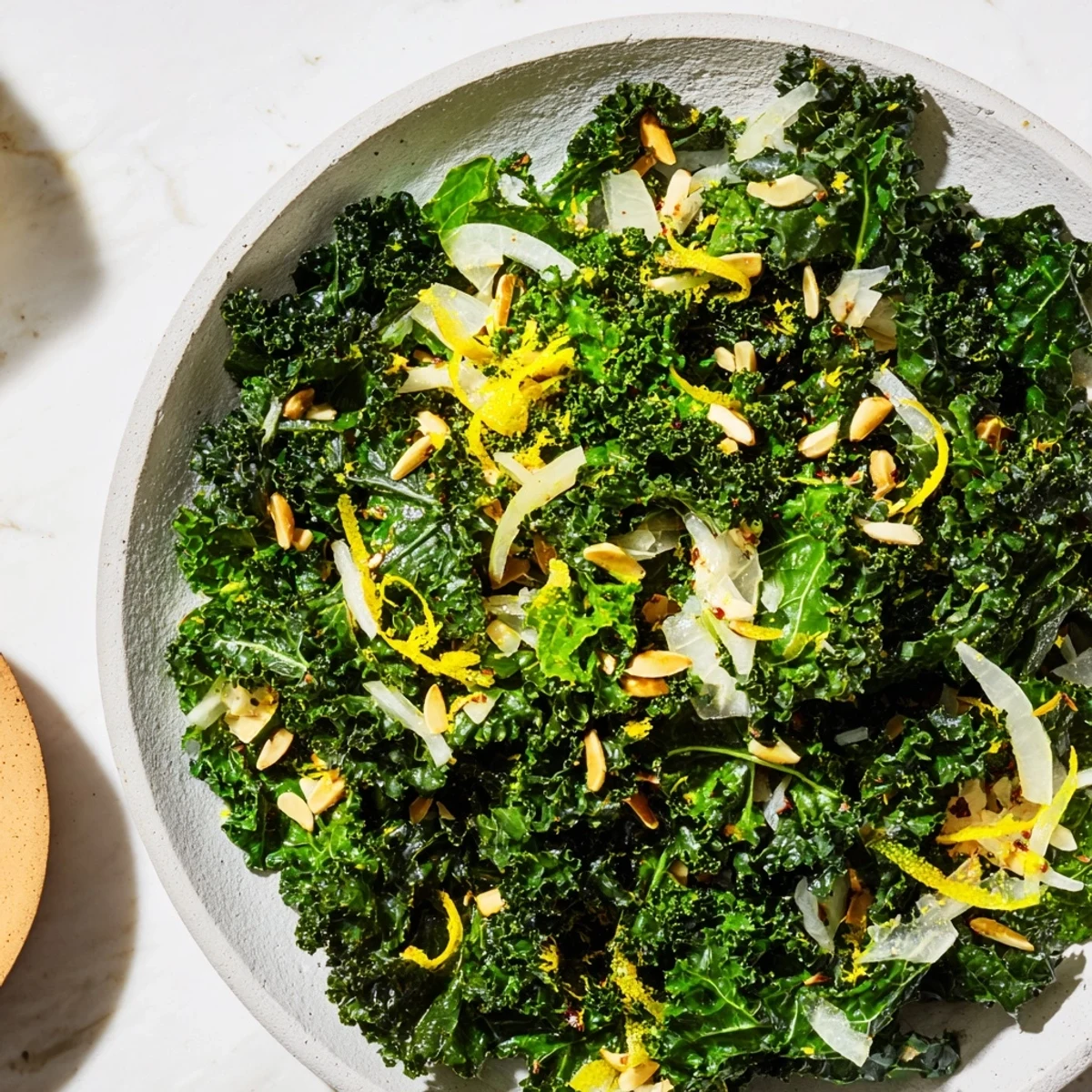 Bright green Emerald Kale sautéed, with a squeeze of lemon, ready to brighten your dinner table.
