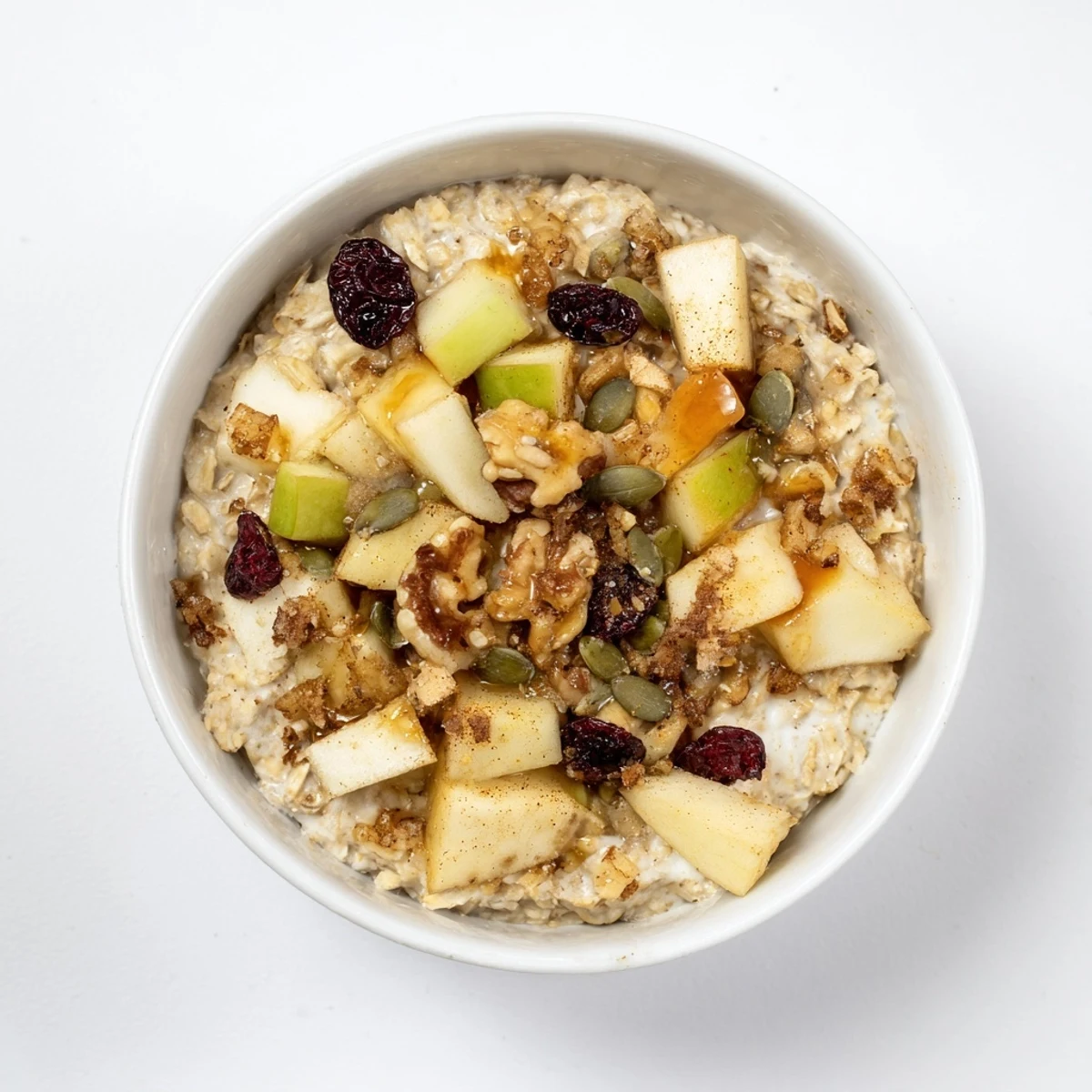 A close-up of delicious Harvest Chai Oat oatmeal, showcasing the spiced flavors and fresh toppings.