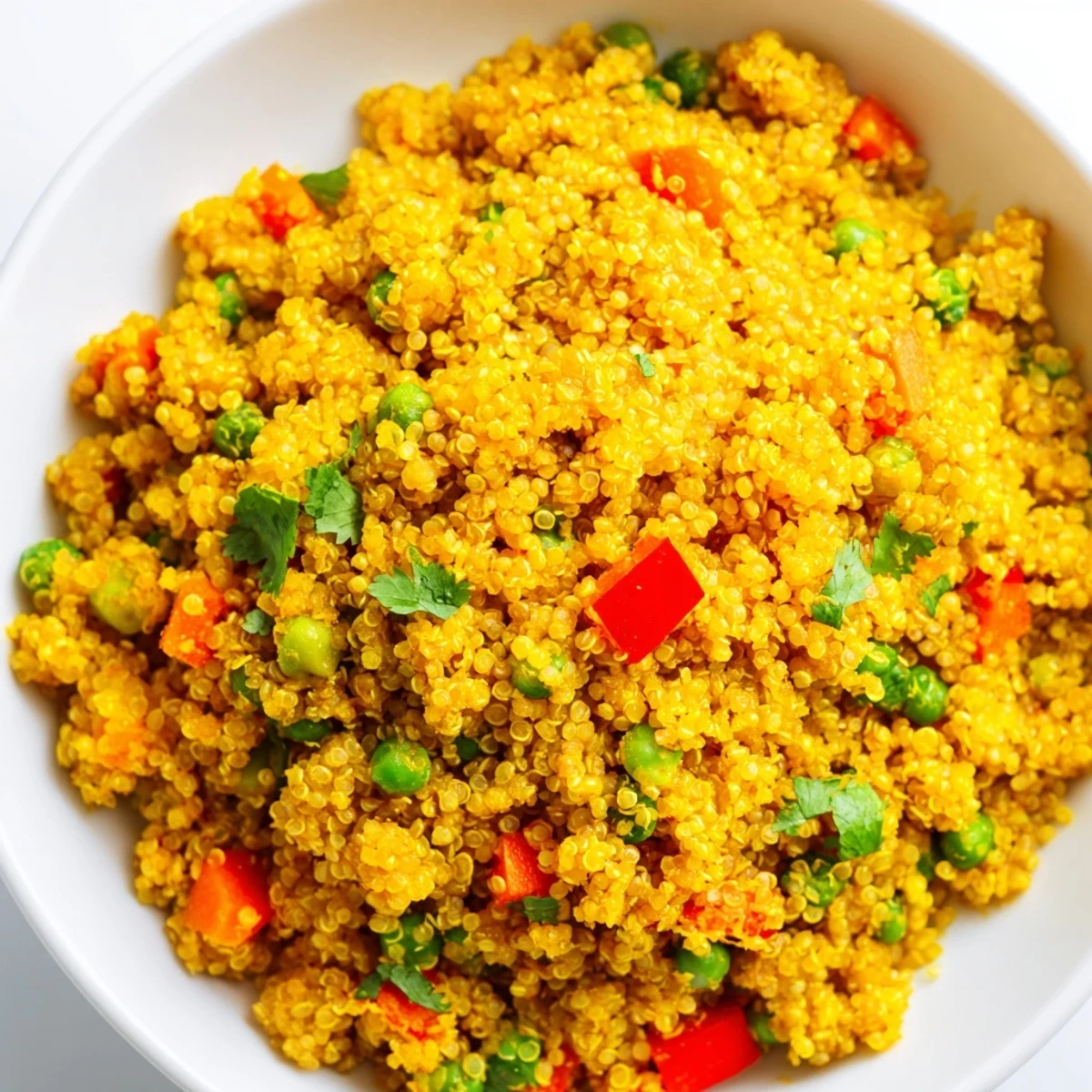 A steaming bowl of Ginger Savory Grain, highlighting the aromatic ginger and herb flecks, ready to serve as a light vegetarian main.