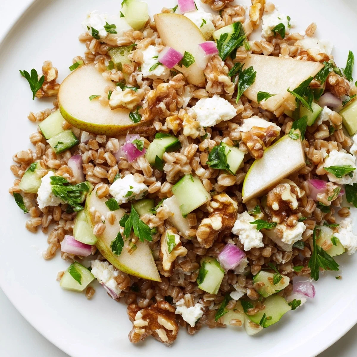 A colorful Pear Savory Grain Salad, full of textures, ready for a light and delicious meal.