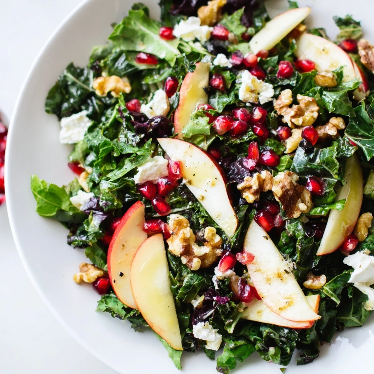 Evergreen Winter Greens mixed with apple slices, pecans, and crumbled goat cheese, tossed in zesty lemon-orange dressing. 