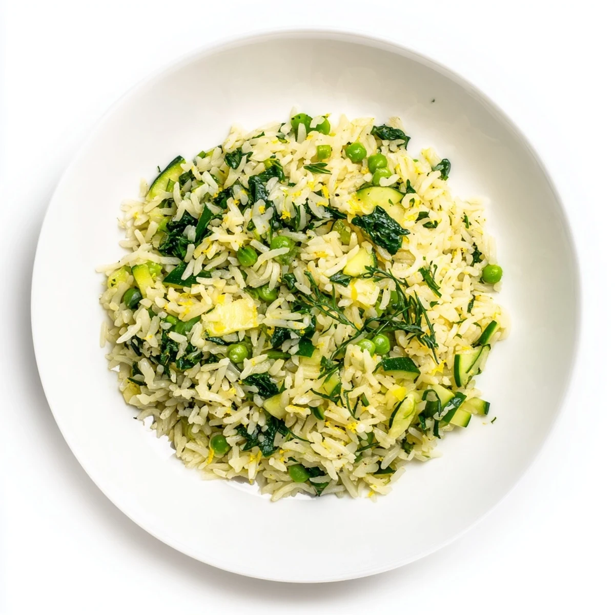 Evergreen Warm Rice features fluffy basmati rice tossed with vibrant spinach, peas, and fresh herbs. 