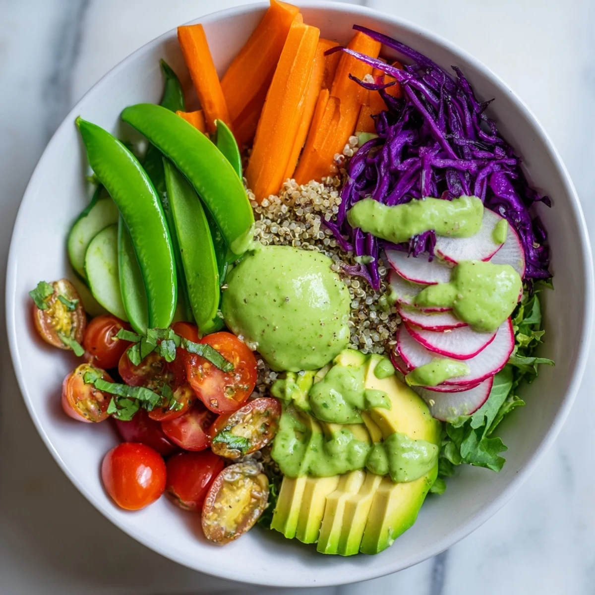 A close-up of the Green Goddess Veggie Bowl, showing quinoa and a sprinkle of pumpkin seeds.