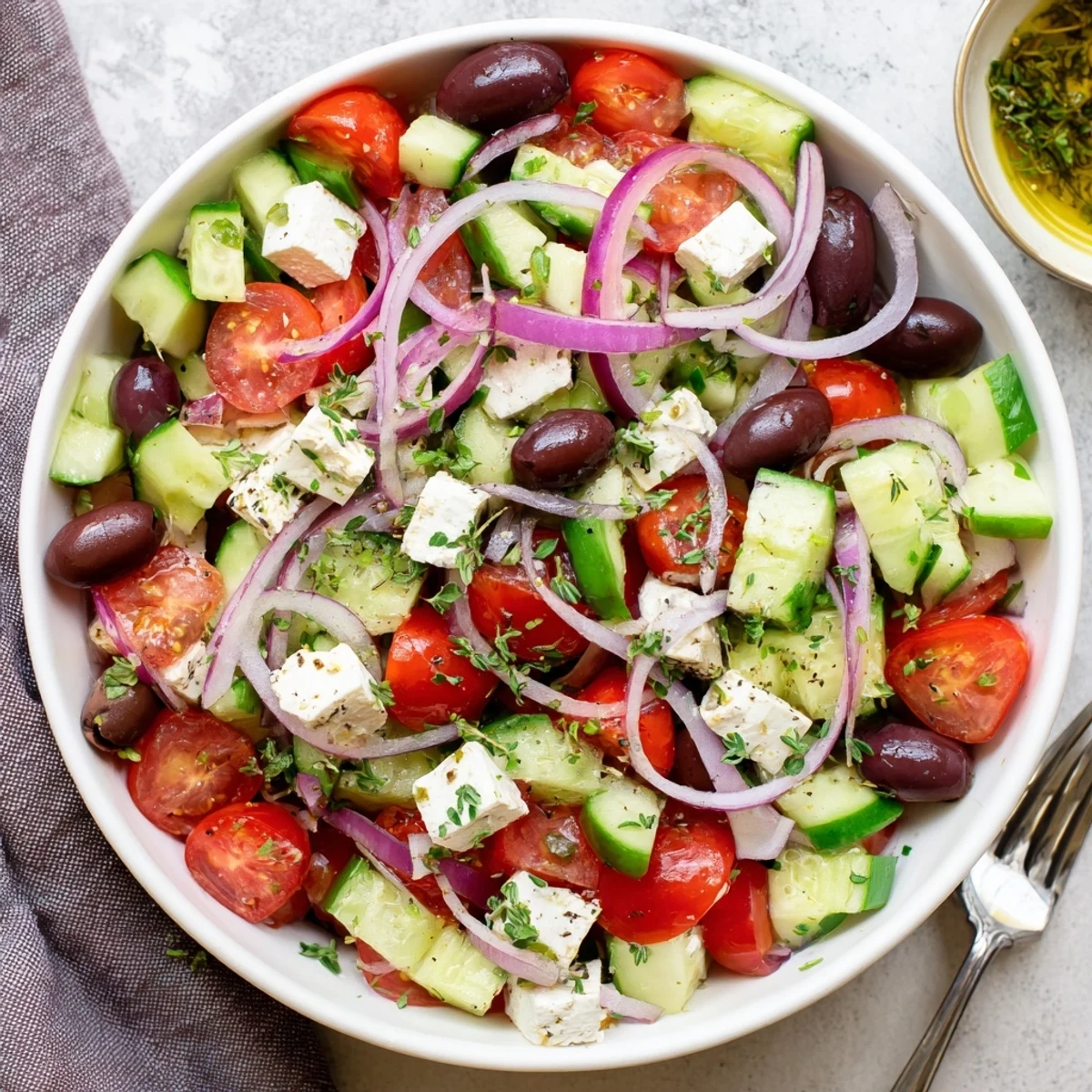 Colorful vegetable salad with ripe cherry tomatoes crisp cucumbers and crumbled feta cheese ready to serve