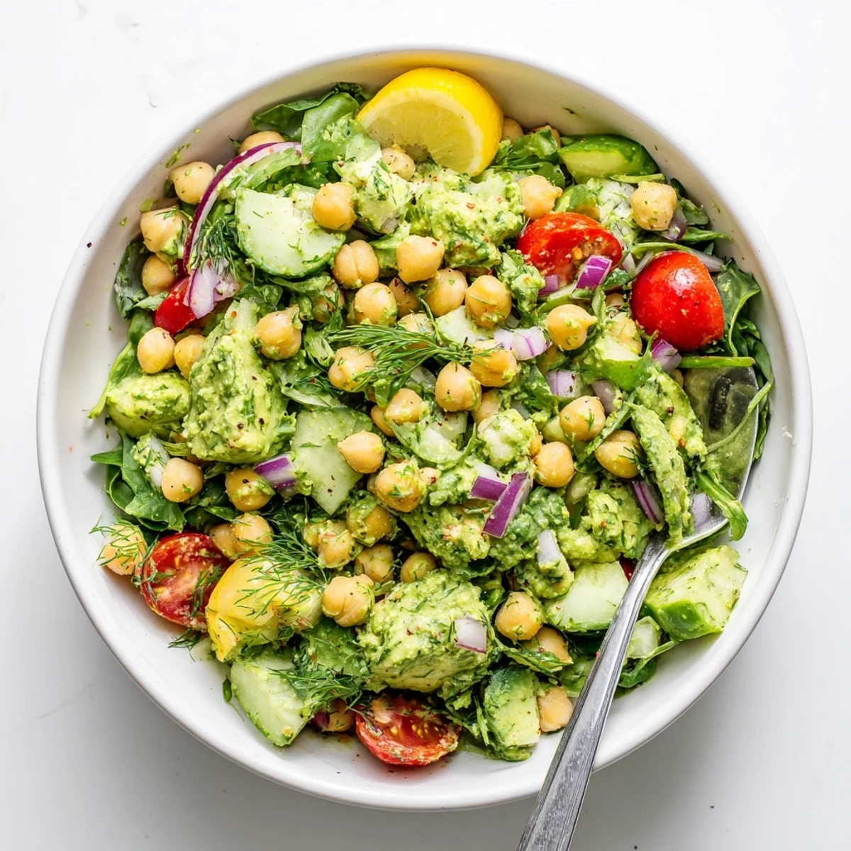 Creamy Avocado Dill Chickpea Salad Bowl with Lemon, bright greens and silky texture.