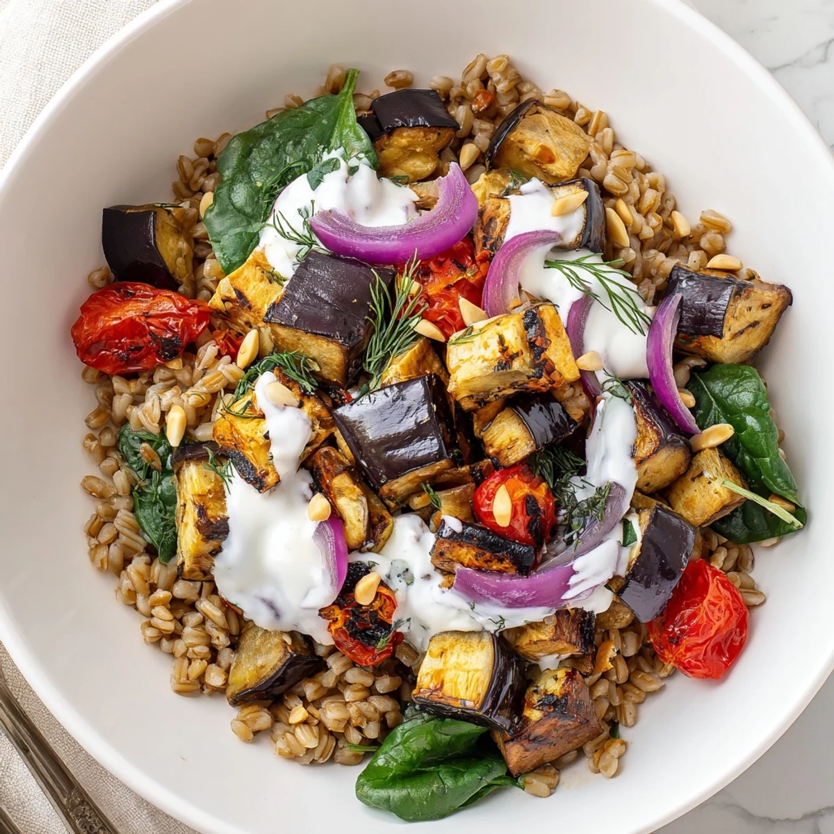 Mediterranean Roasted Eggplant Farro Grain Bowl with Yogurt, smoky eggplant and feta