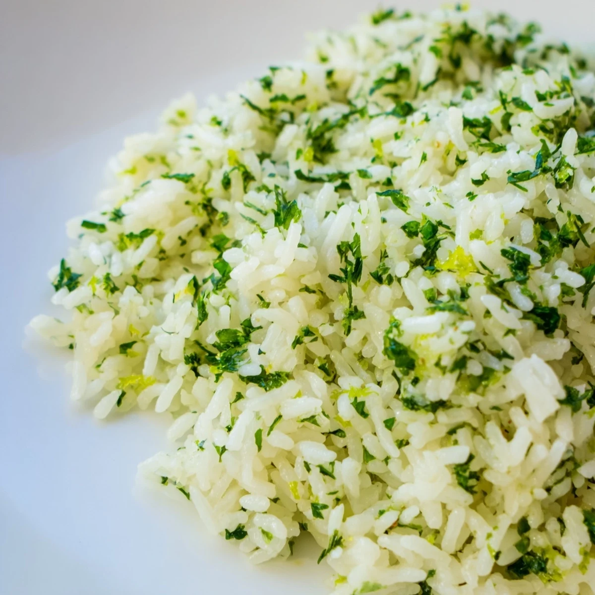 Steaming plate of garlic herb jasmine rice served with savory caramelized roasted mushrooms