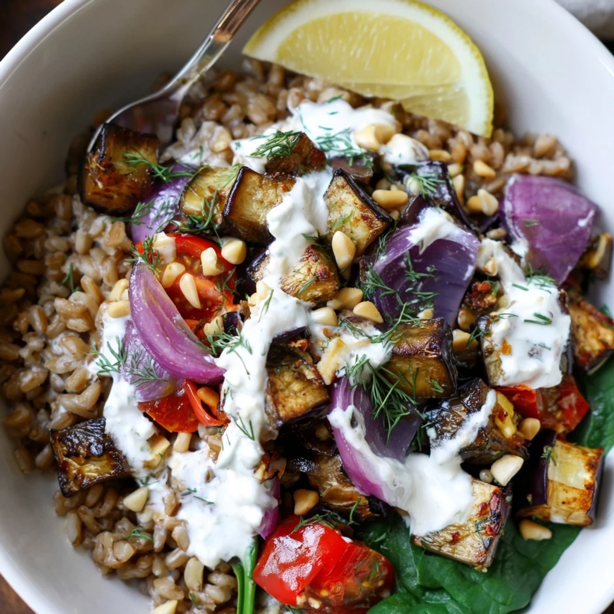 Mediterranean Roasted Eggplant Farro Grain Bowl with Yogurt, chewy grains and toasted pine nuts