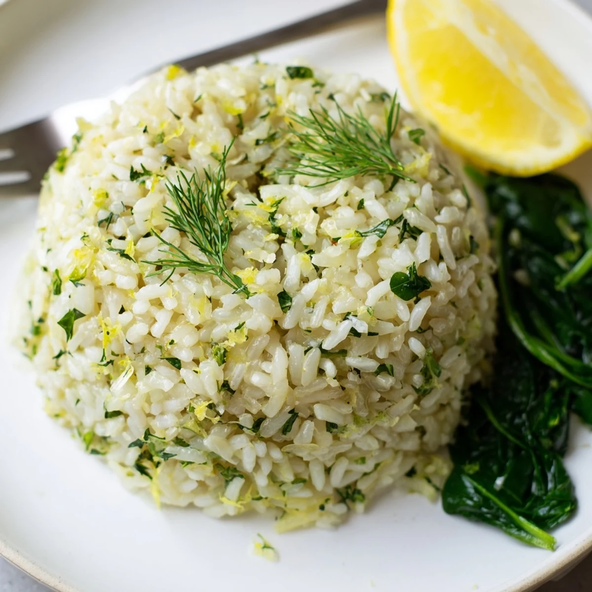 Steamed fluffy grains and garlicky greens: Garlic Lemon Herb Jasmine Rice with Sautéed Spinach.