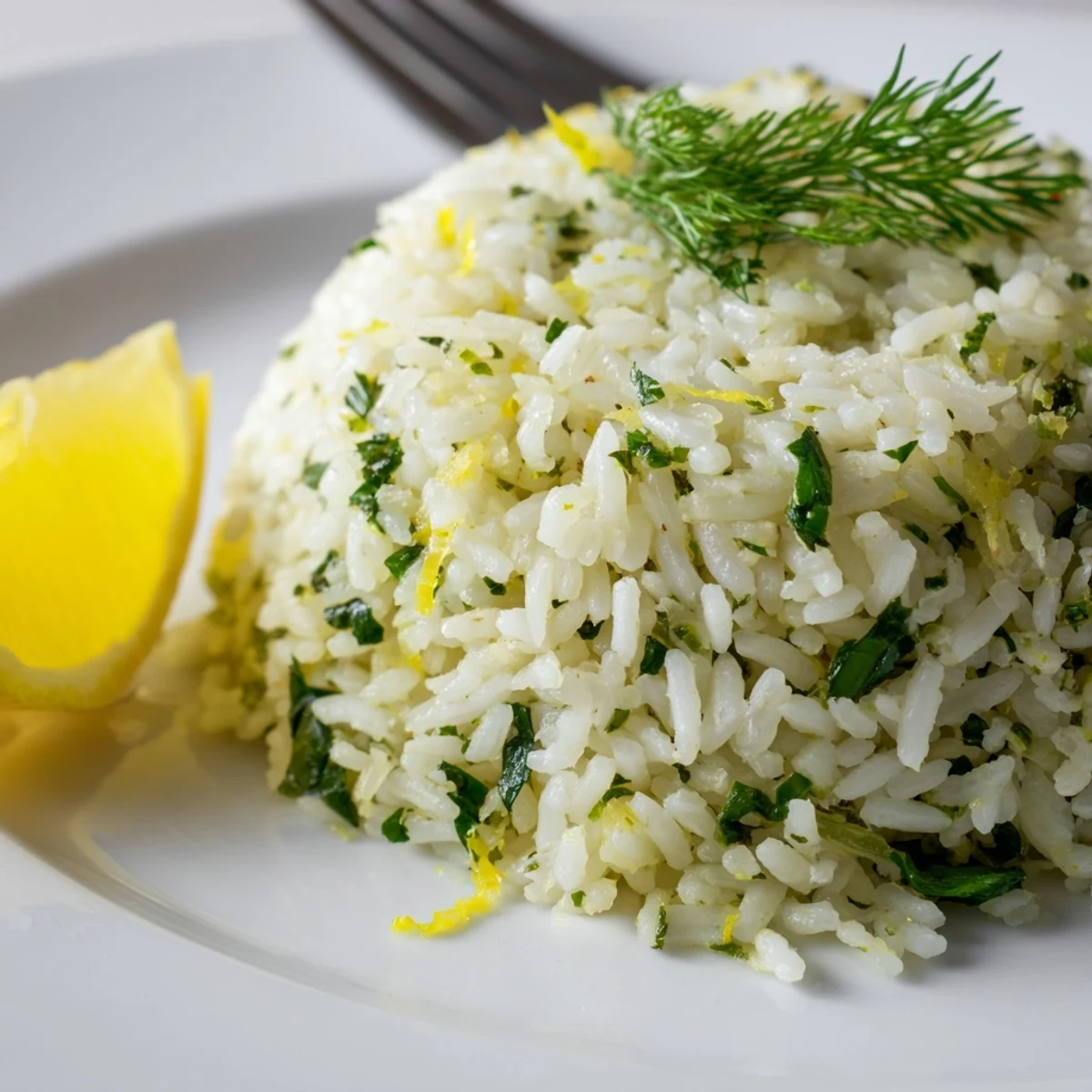 Garlic Lemon Herb Jasmine Rice with Sautéed Spinach, steaming and fragrant.