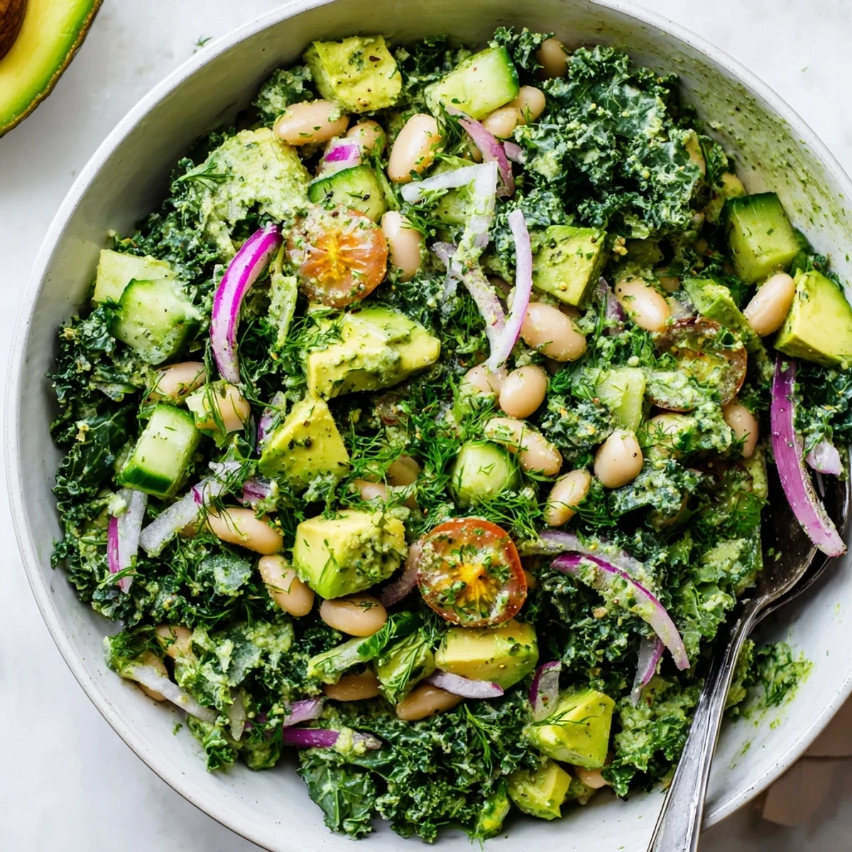 Bright and herbaceous, the Creamy Avocado White Bean Kale Salad Bowl with Fresh Herbs