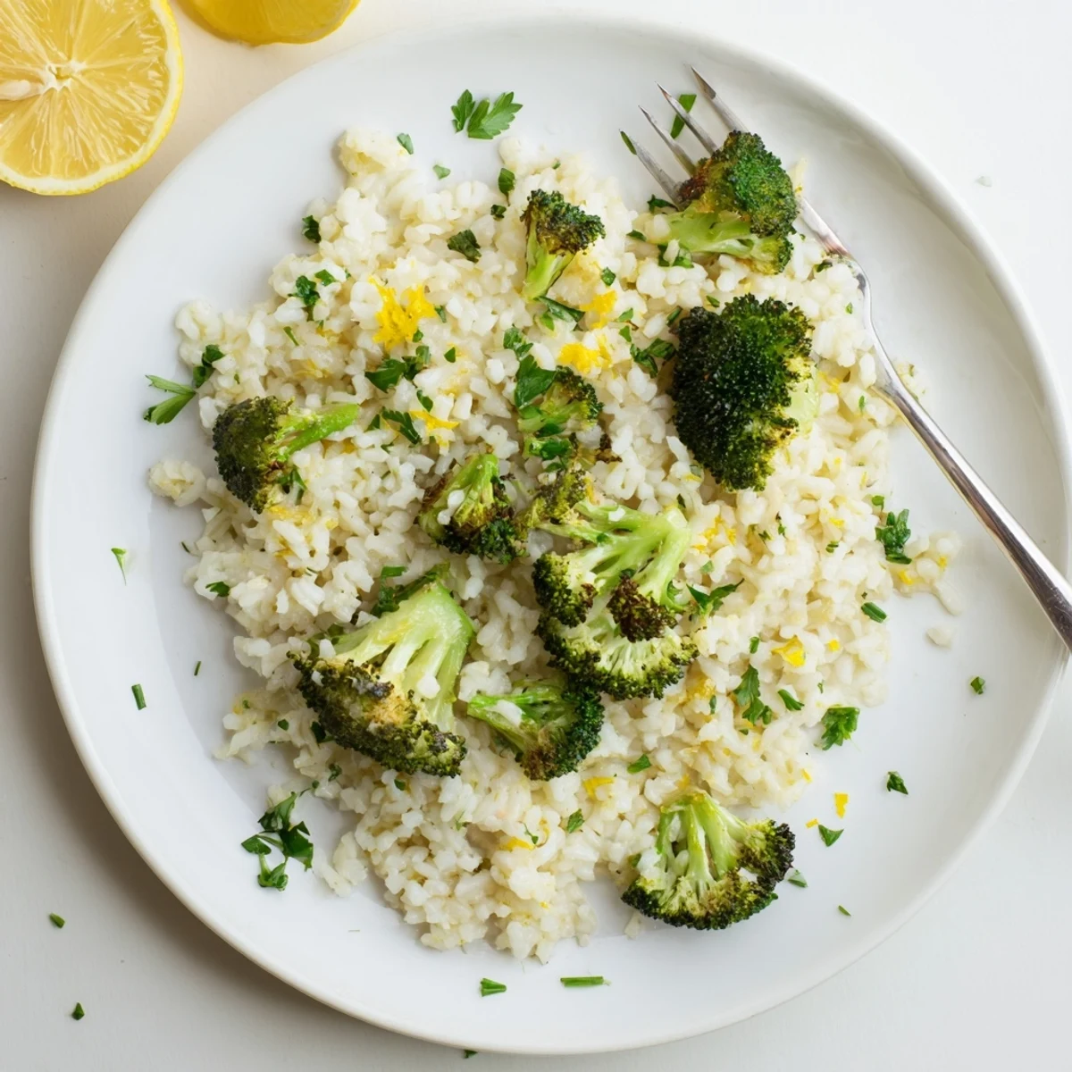 Fluffy garlic lemon jasmine rice with roasted broccoli topped with fresh parsley
