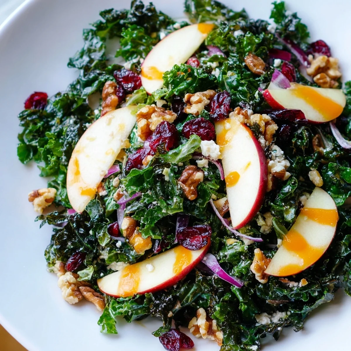 Shaved Kale Apple Walnut Salad Bowl with bright citrus dressing and toasted nuts